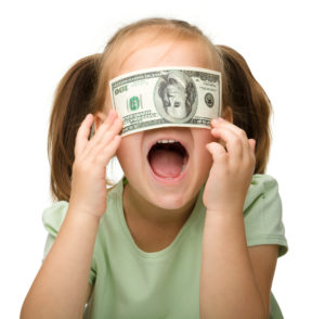Little girl with money